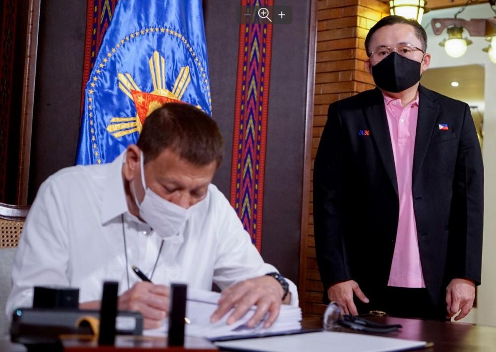 President Rodrigo Duterte signs the Bayanihan 2