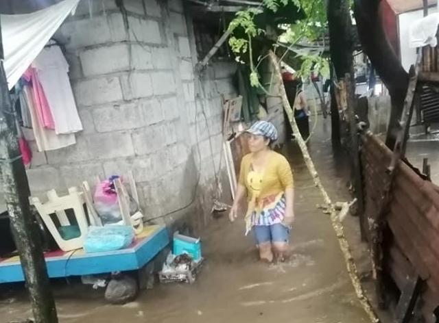 Torrential rains lashed Lucena in Quezon province on Thursday morning, causing floods in some areas of the city.