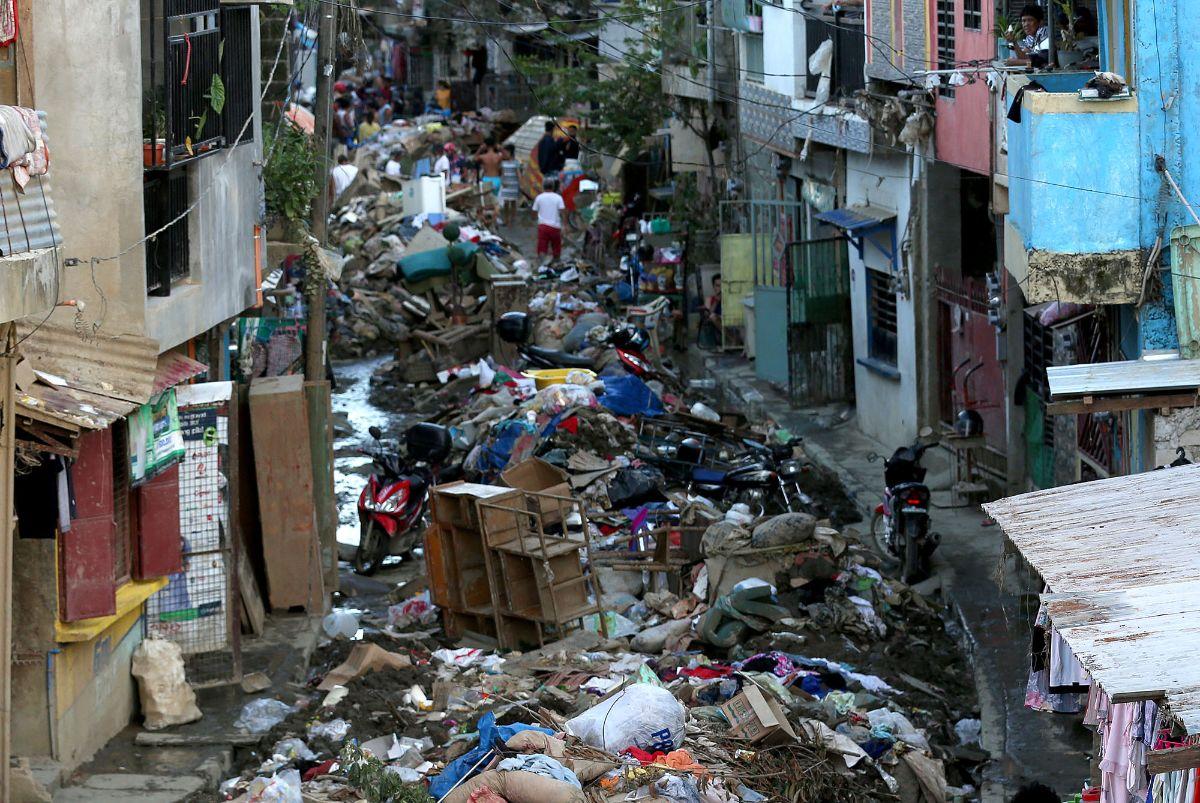 Marikina streets still full of debris after Ulysses | Photos | GMA News ...