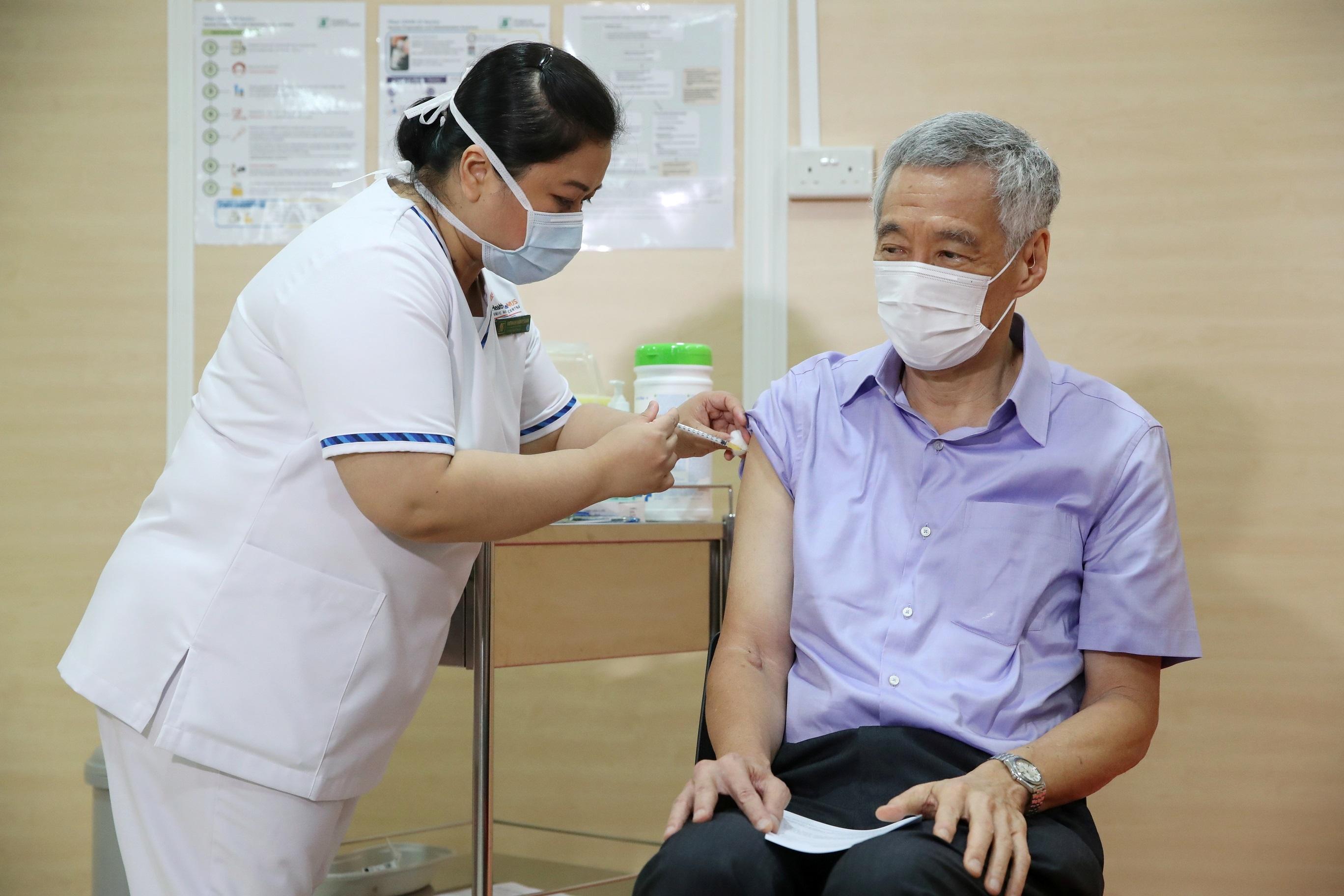 'Please take it,' Singapore PM says after getting COVID-19 ...
