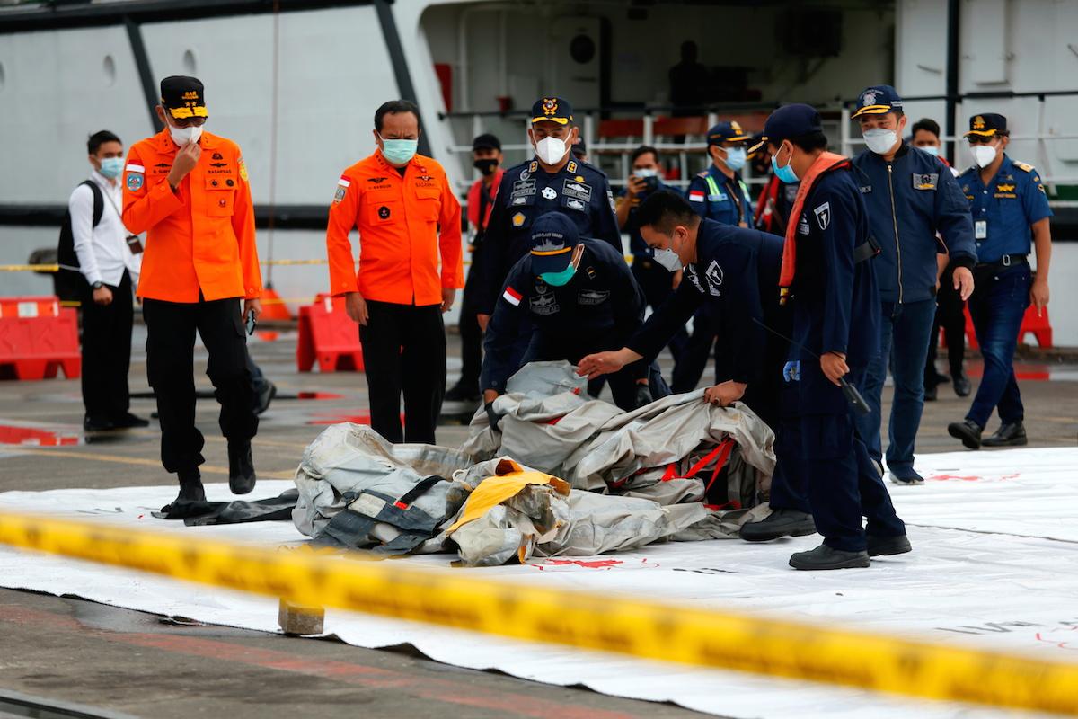 Body parts found at Indonesian plane crash site