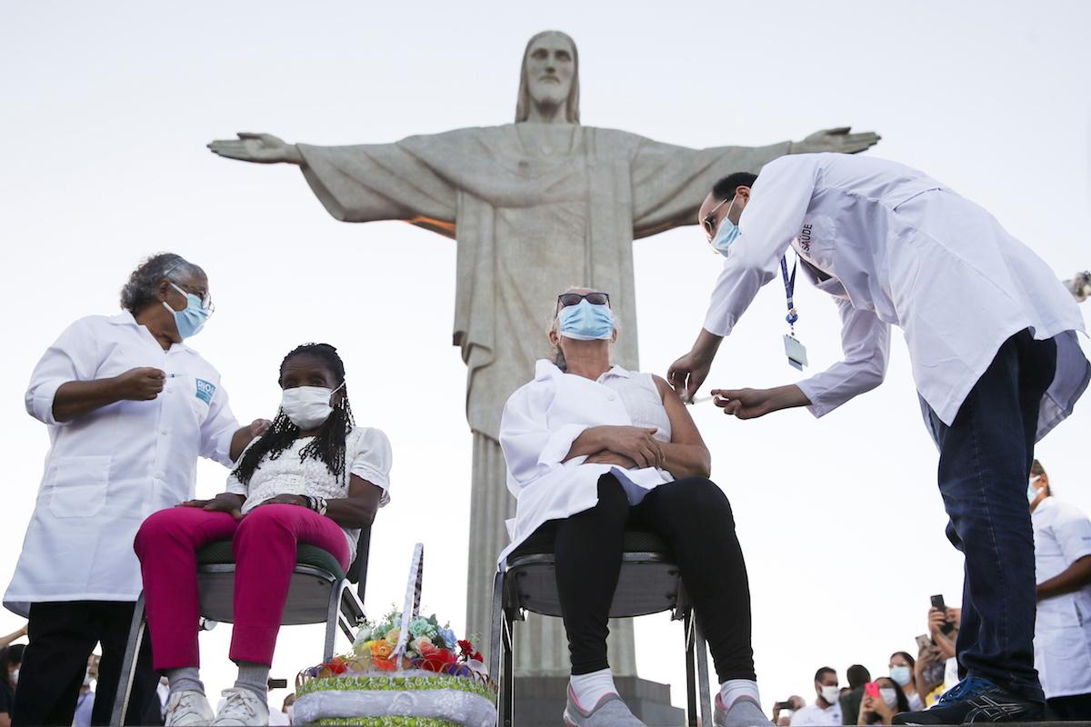Brazil vaccinations start as country faces vaccine ingredient shortfall