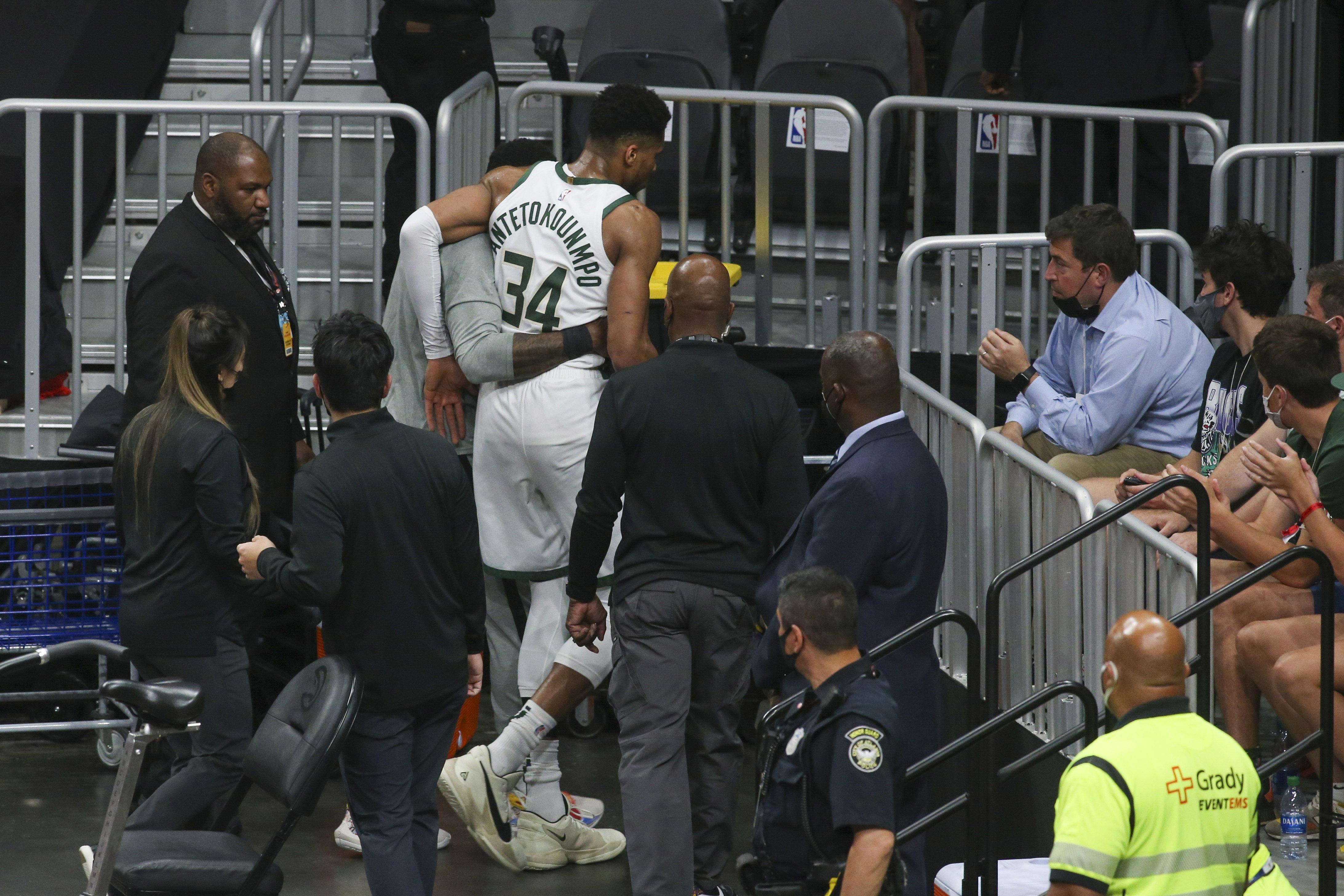 Bucks' Giannis Antetokounmpo injures knee in Game 4 of East Finals vs