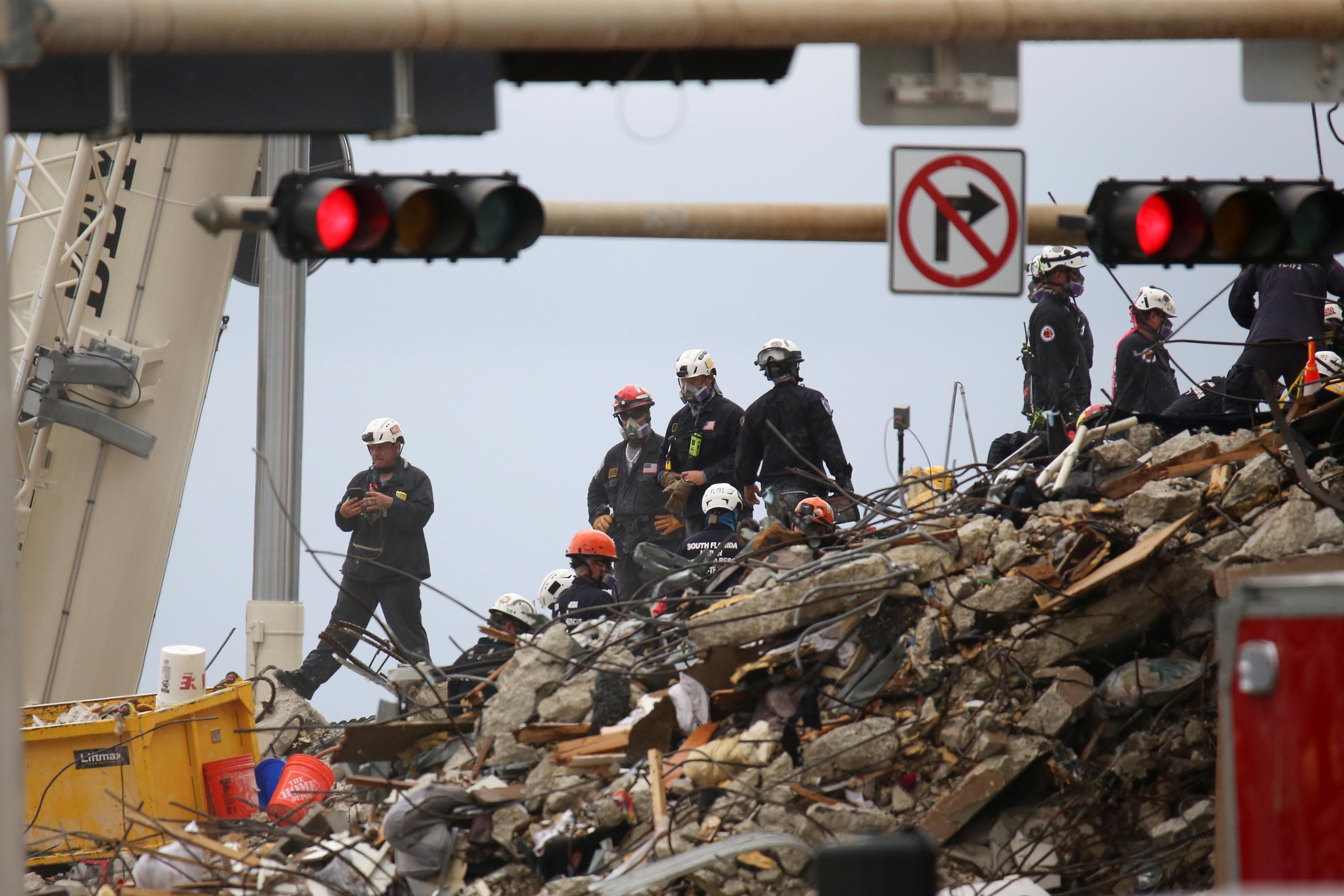 Second Florida building evacuated as death toll rises to 22 in condo tower collapse