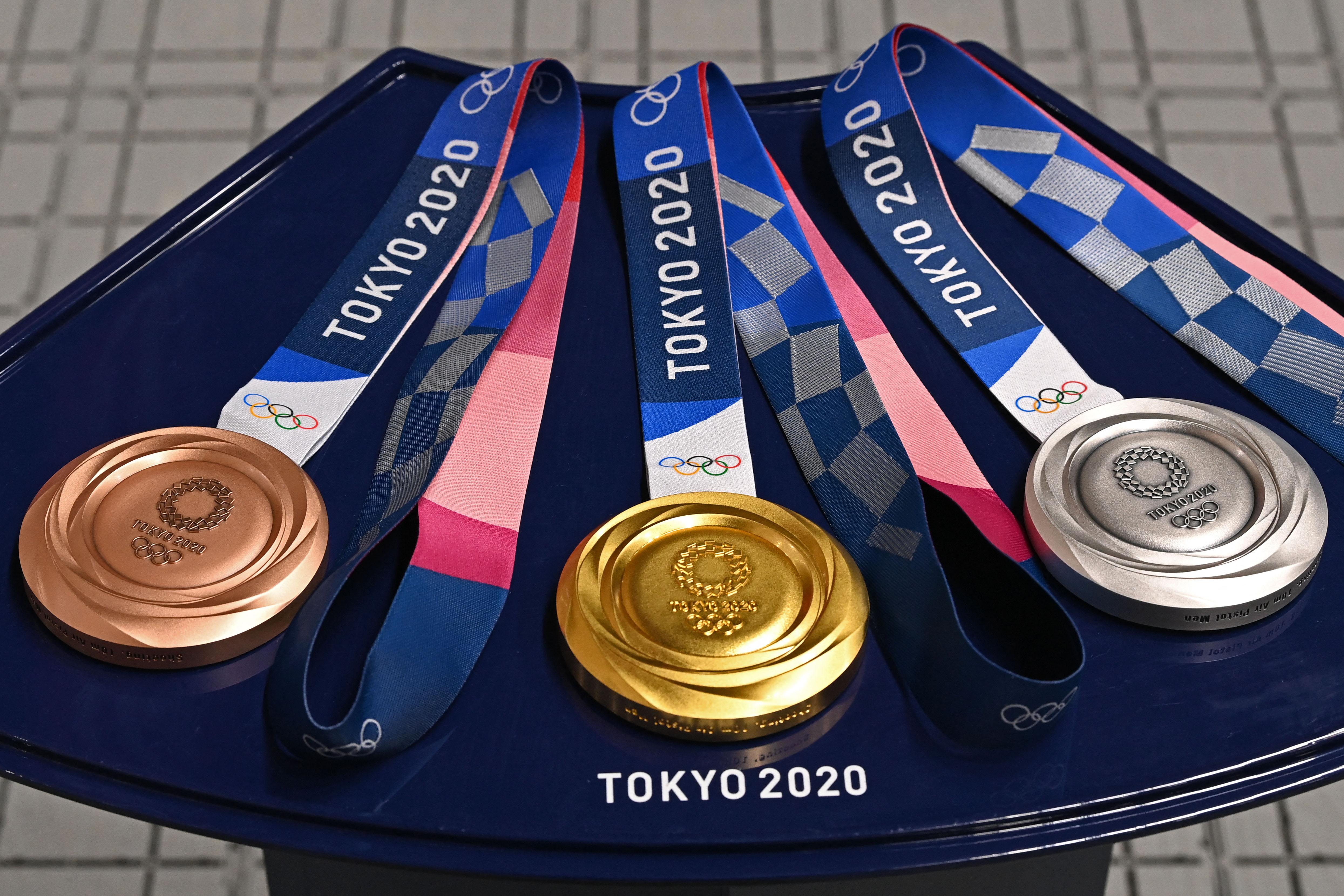 Летние игры россия медали. Олимпийские медали Токио 2021. Золотая медаль Токио 2020. Медаль Олимпийских игр 2020.