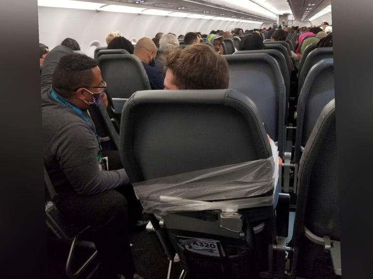 Frontier Airlines Passenger Taped To Seat Arrested After Altercation Gma News Online