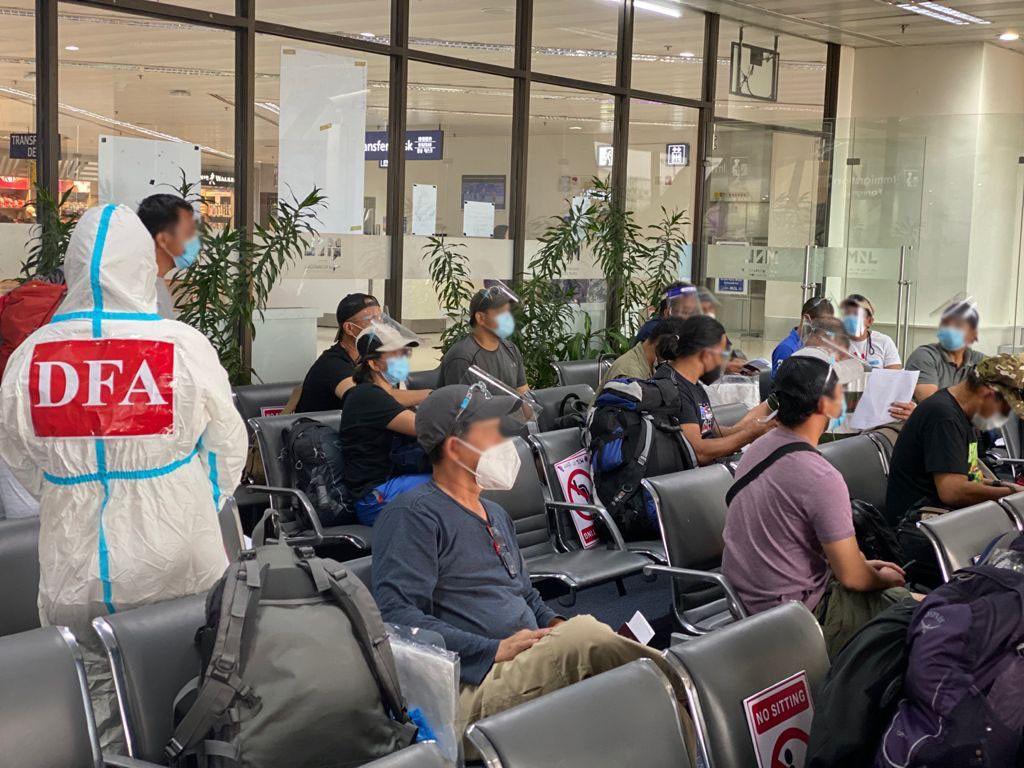 35 repatriated Pinoys from Afghanistan arrive in Manila