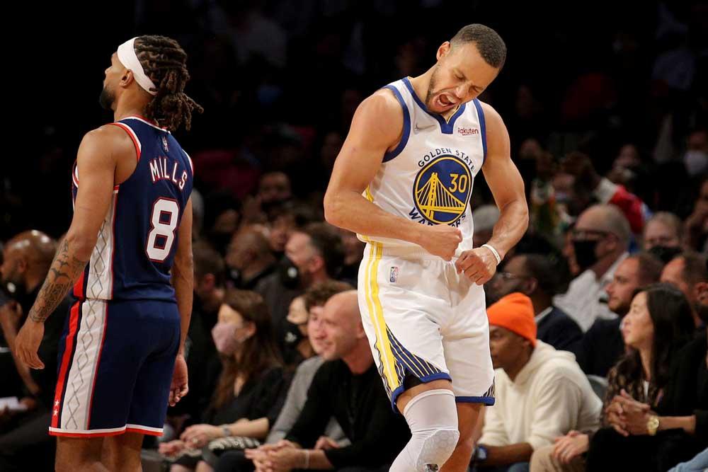 Stephen Curry memasukkan 37 gol saat Warriors mengalahkan Nets
