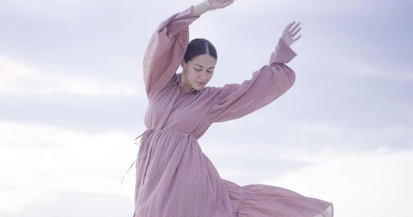 LOOK: Marian Rivera is a picture of joy and freedom in flowy lilac dress at the beach