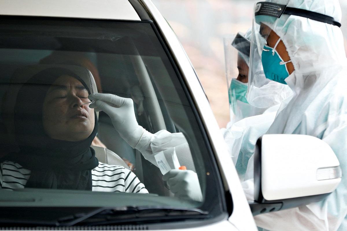 Indonesia bans foreign tourist arrivals at Jakarta airport as COVID-19 spikes