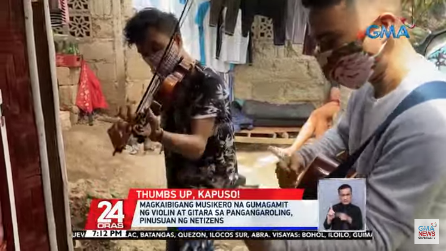 Penyanyi Natal bermain gitar, biola memukau warga di Cebu GMA News Online