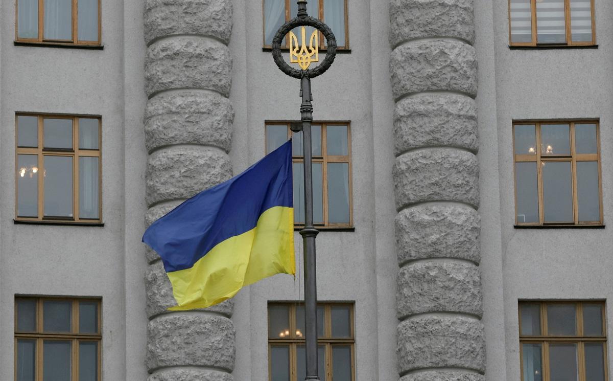 Blue and yellow flag, Russian dead attest to Ukrainian advance in south