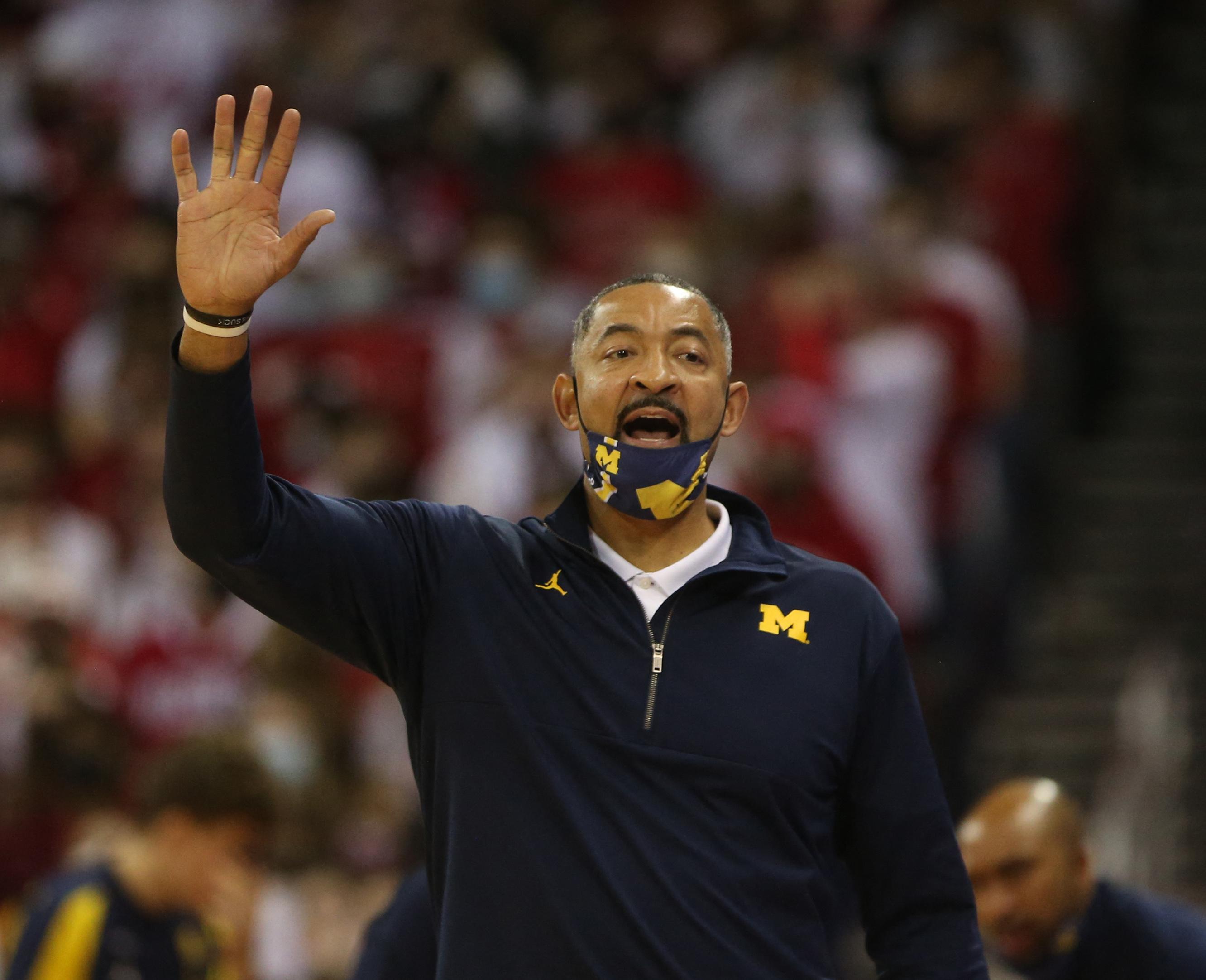 Michigan coach Juwan Howard throws punch in postgame altercation | GMA News  Online