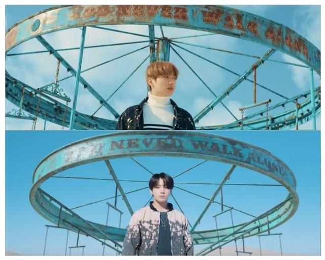 Jungkook once again stands in front of an abandoned amusement park ride that first showed up in the "Spring Day" MV.