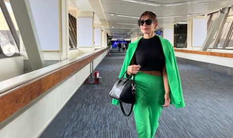 Andrea Torres is stylish in green as she flies to Japan for Philippine ...