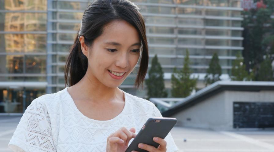 Cover photo showing woman using a phone