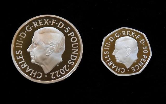 The official coin effigy of Britainâ€™s King Charles III is seen on a Â£5 crown and 50 pence coin, unveiled by The Royal Mint, in London, Britain, September 29, 2022. REUTERS/Peter Nicholls