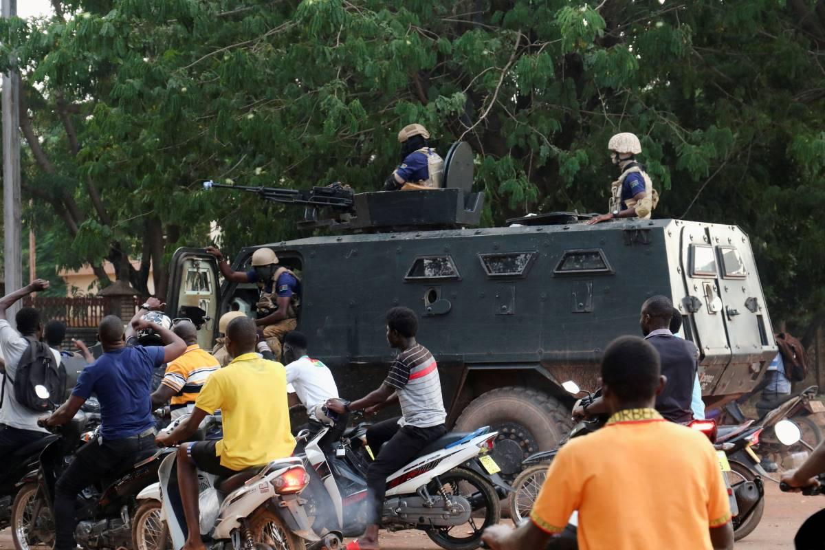 Gunfire, confusion grip Burkina Faso day after coup, fire breaks out at French embassy