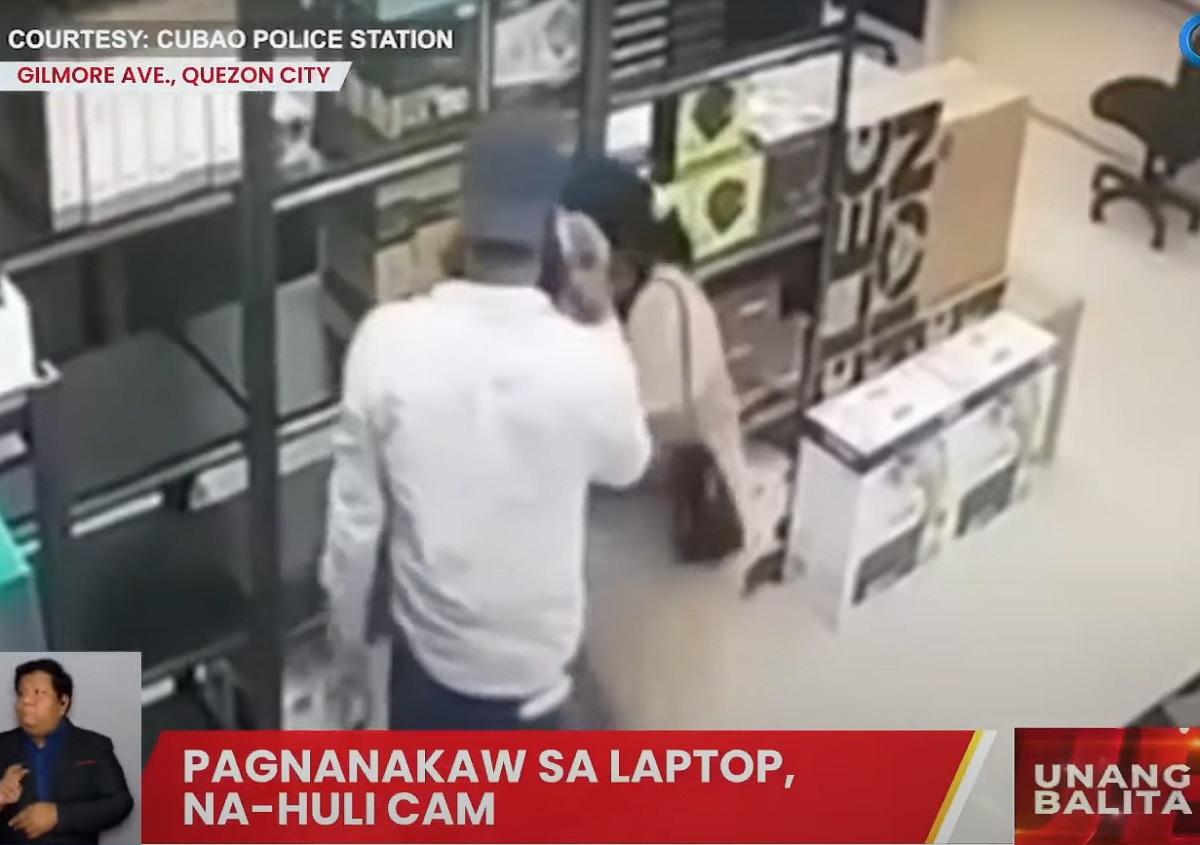 Pencurian, tertangkap kamera;  laptop dicuri, diselipkan di rok