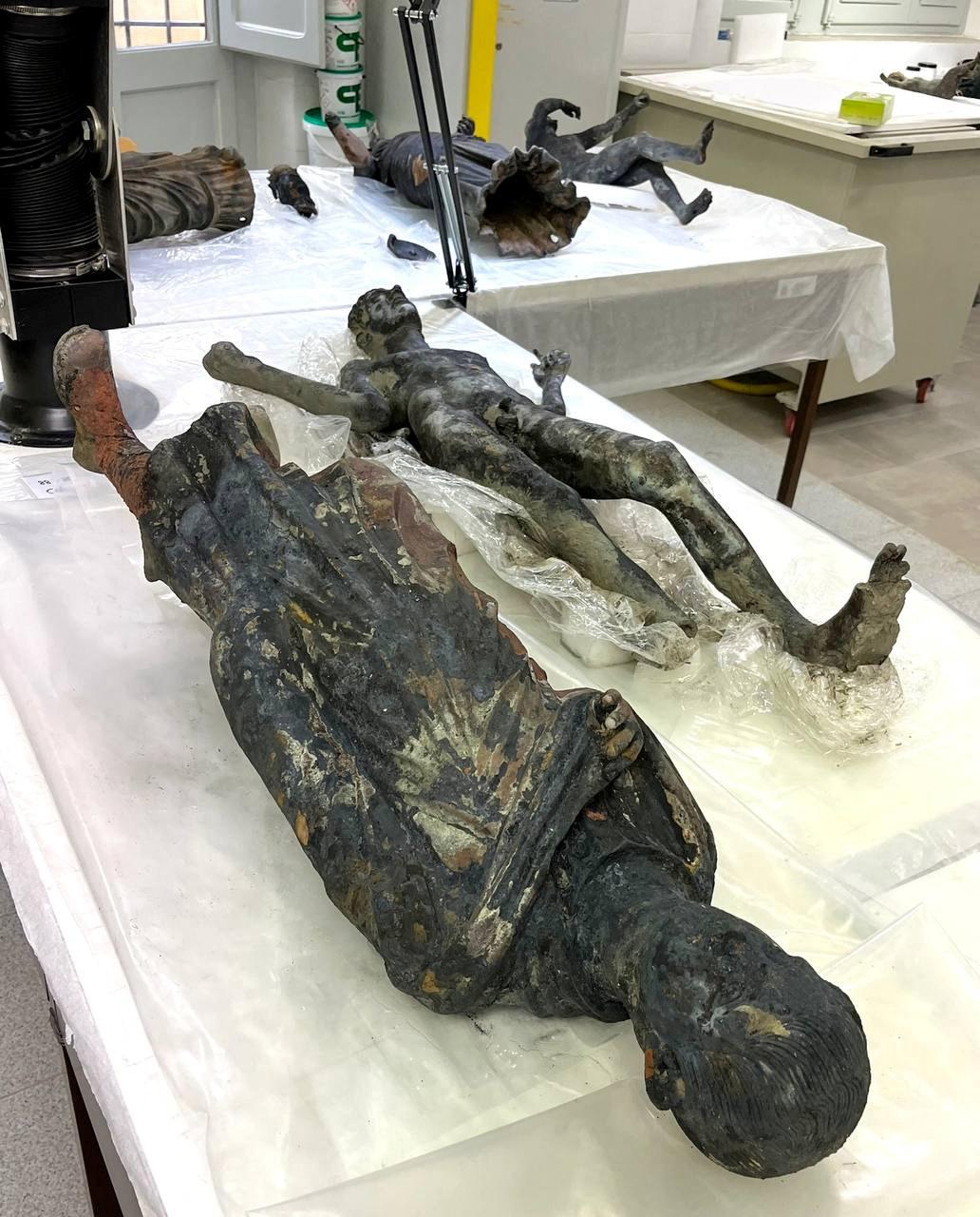 Newly discovered 2,300-year-old bronze statues are displayed at a laboratory in Grosseto, Italy, in this handout photo obtained by Reuters on November 8, 2022. Ministero della Cultura/ Handout via REUTERS