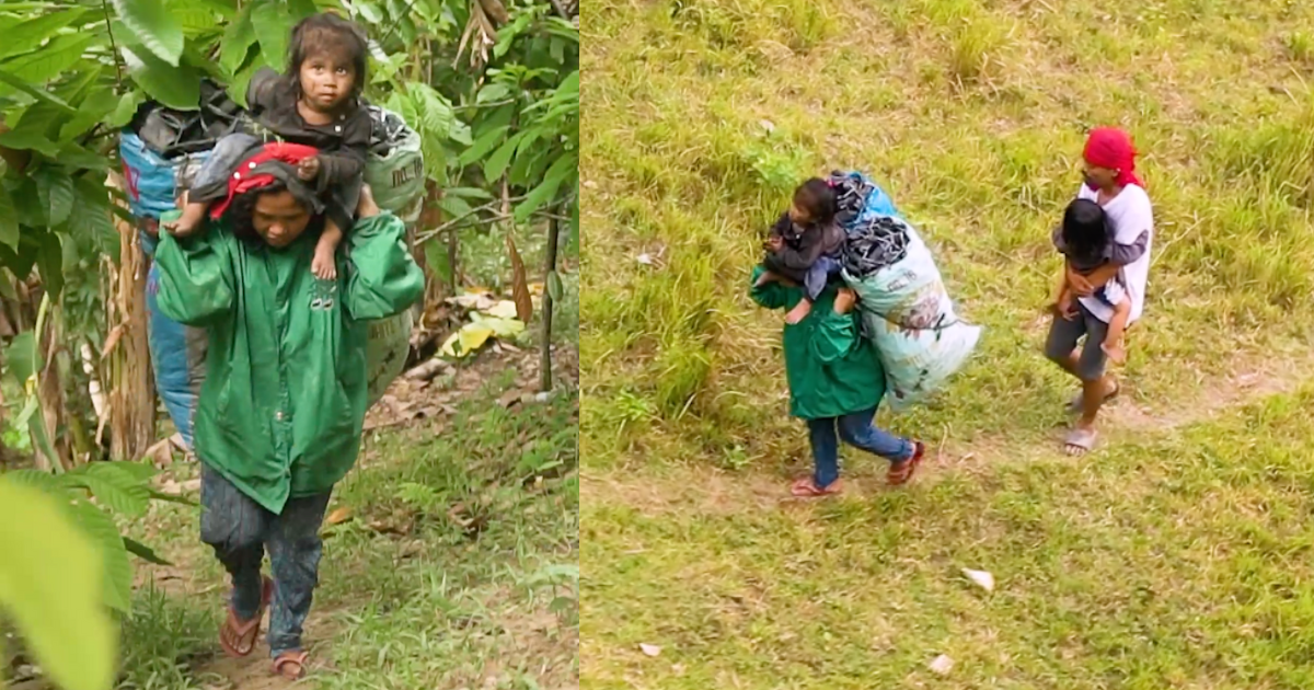 Pregnant woman carries sacks of charcoal to support family GMA News