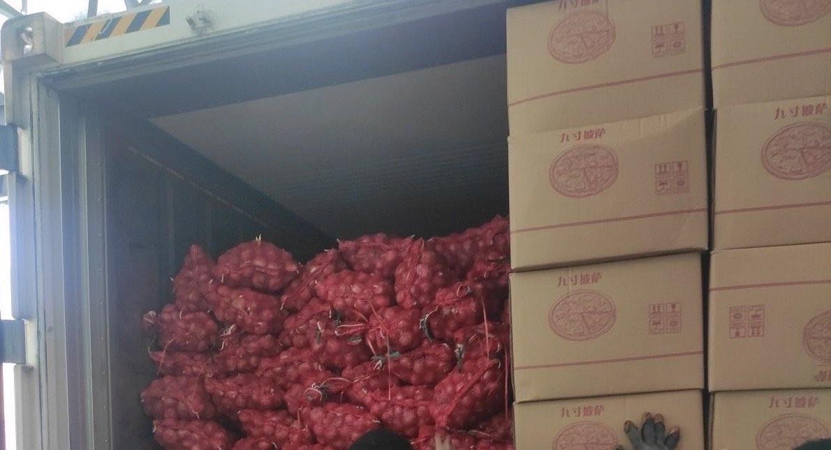 BOC seizes P104M worth of illegally imported onions, sugar, cigarettes