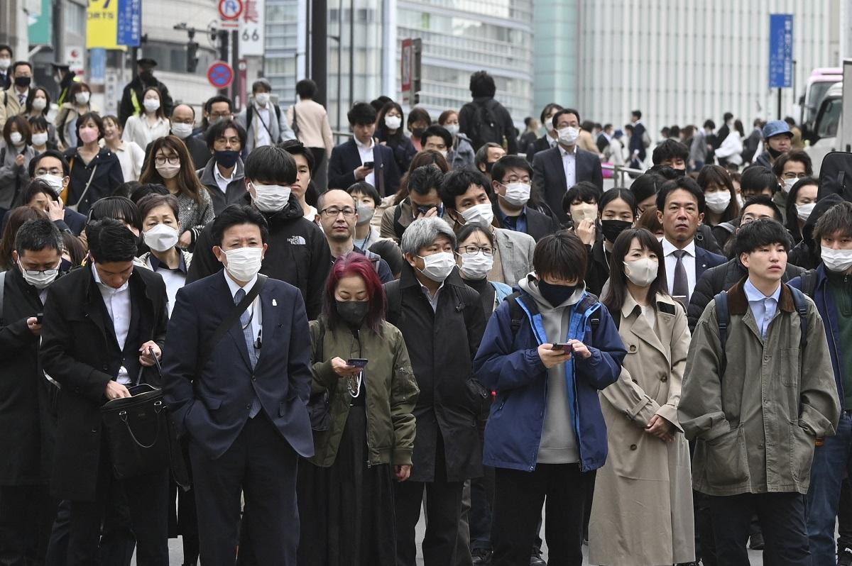 Japan eases mask guidelines, but few are keen to change