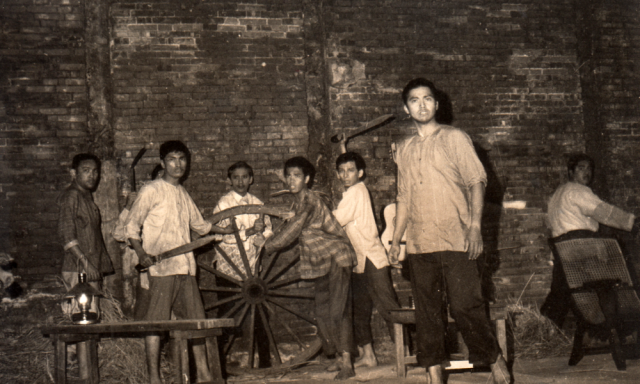 Robert Arevalo (center, foreground) and Vic Silayan (far right) with PETA Kalinangan Ensemble actors in a scene from "Bayaning Huwad". Photo from PETA Archives courtesy of CB Garrucho