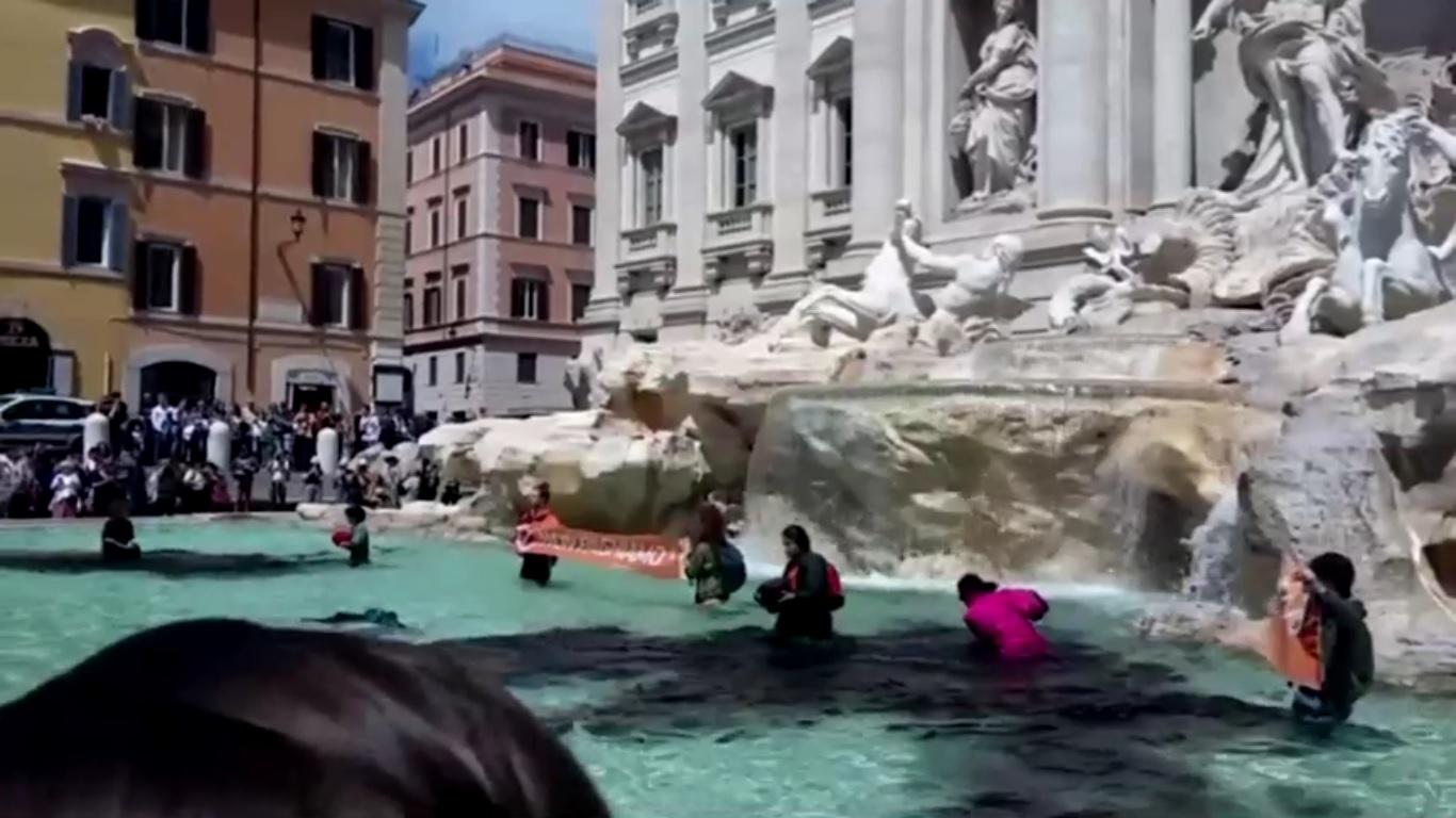 Trevi Fountain water turns black in Rome climate protest GMA News Online