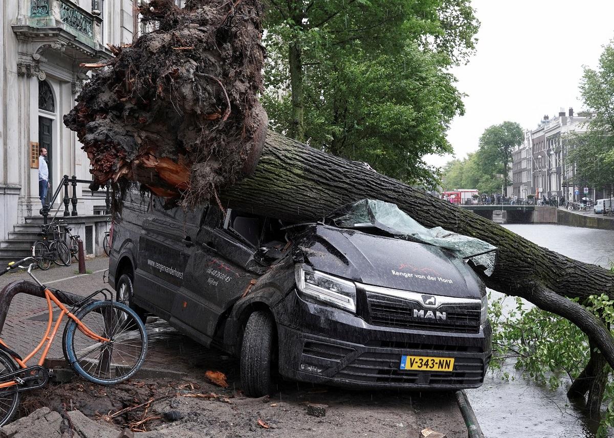 One dead as rare summer storm hits Netherlands