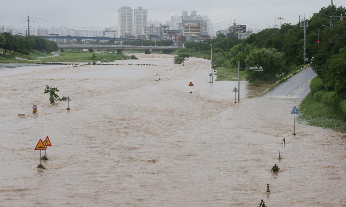 At least 31 killed by heavy rains in South Korea; rescuers hunt for missing people