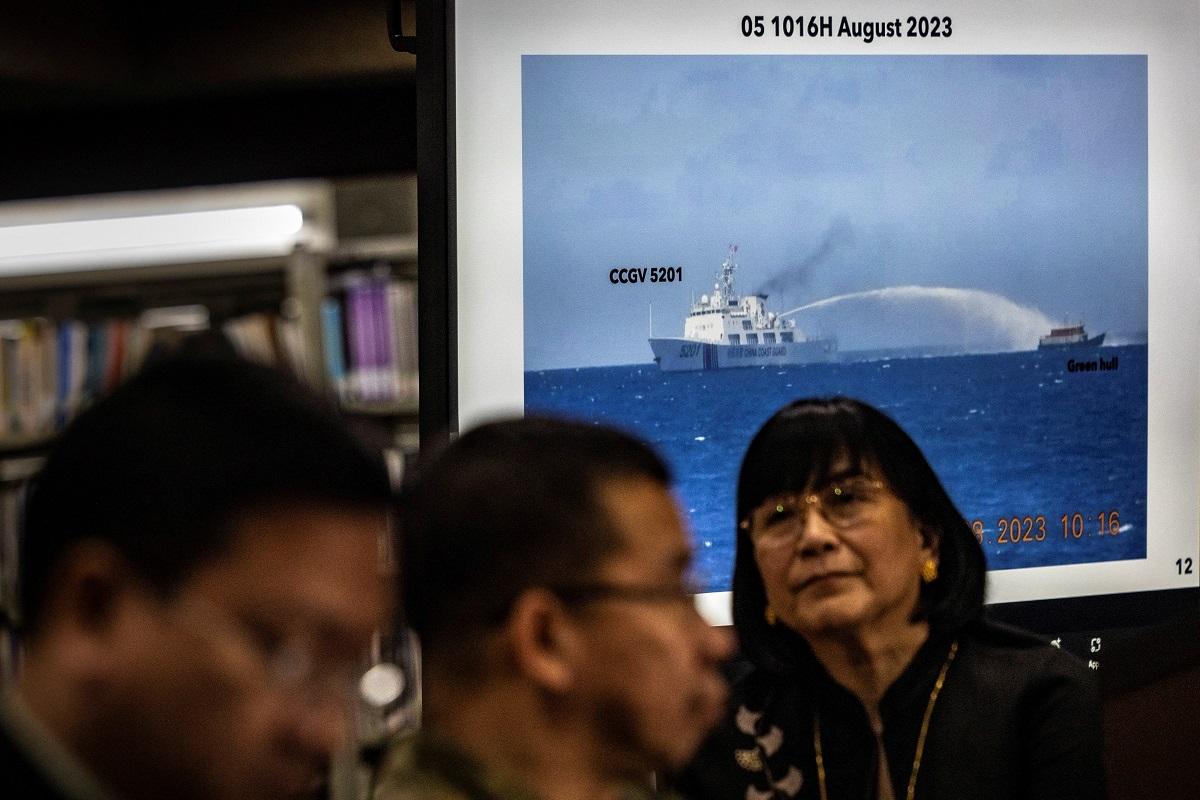 Footage of a Chinese Coast Guard ship using a water cannon against a Philippine resupply vessel is shown during a press conference at the Department of Foreign Affairs in Manila, August 07, 2023. Ezra Acayan/ Pool via REUTERS