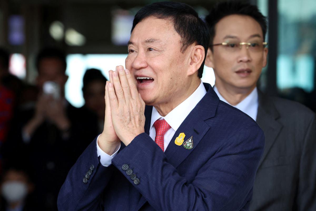 Thailand ex-PM Thaksin Shinawatra returns, faces arrest