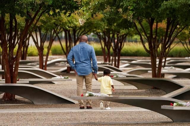 Family members of a victim visit the Pentagon Memorial on the 22nd anniversary of September 11, 2001 attacks, in Washington, DC on September 11, 2023. REUTERS/ Kevin Lamarque