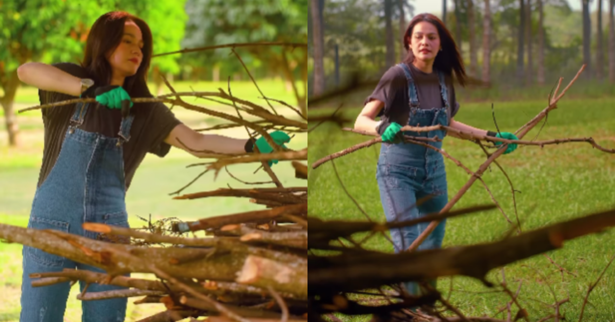 Bea Alonzo collects fallen branches at her farm