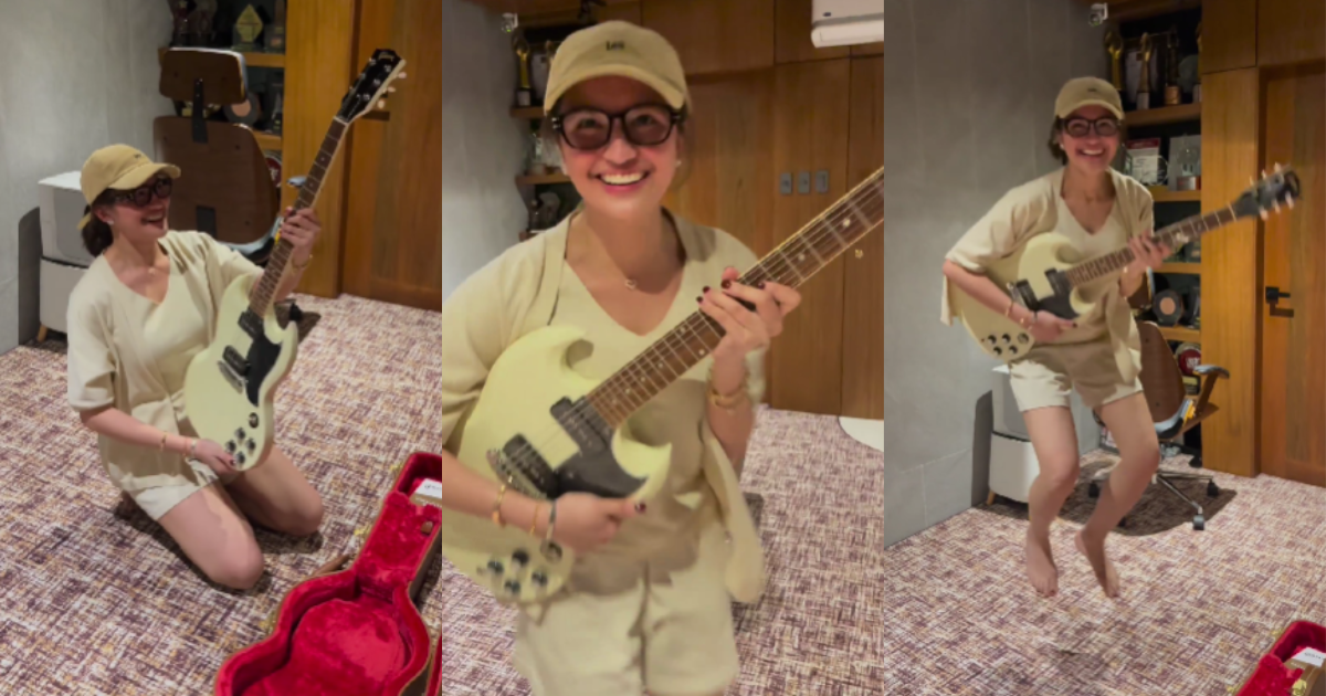 Julie Anne San Jose is overjoyed to receive an electric guitar from Rayver Cruz