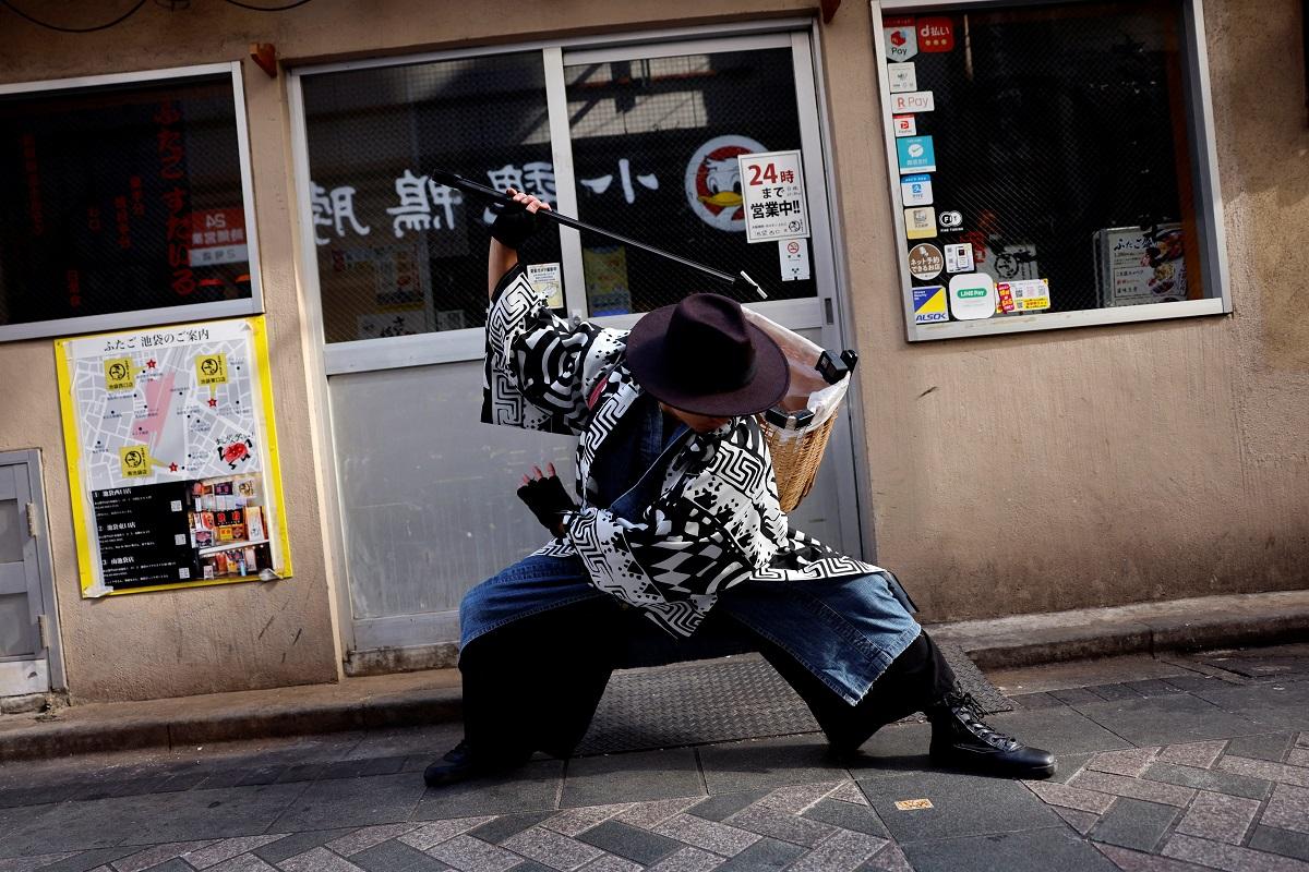 Samurai trash collectors clean Tokyo streets after Halloween revels