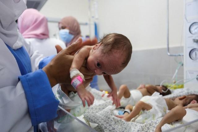 Premature babies evacuated from Al-Shifa Hospital in Gaza City receive treatment at an hospital in Rafah, in the southern Gaza Strip, November 19, 2023. They were evacuated by the Palestinian Red Crescent and UN agencies amid Israel's incursion and bombardment. REUTERS/ Hatem Khaled