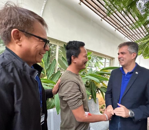 OFW and freed Hamas hostage Jimmy Pacheco meets with Israeli Foreign Minister Eli Cohen with Philippine Ambassador Junie Laylo.