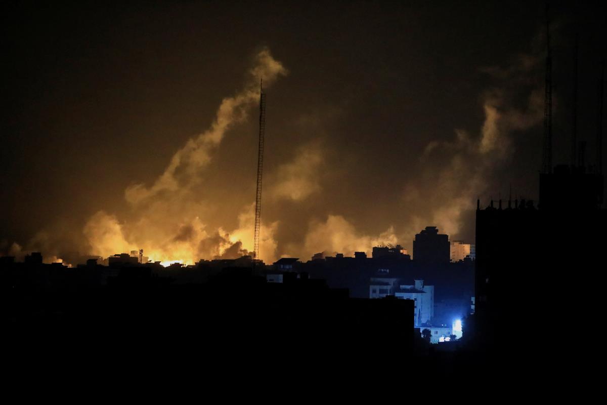 Smoke and flames rise during an Israeli airstrike in Gaza