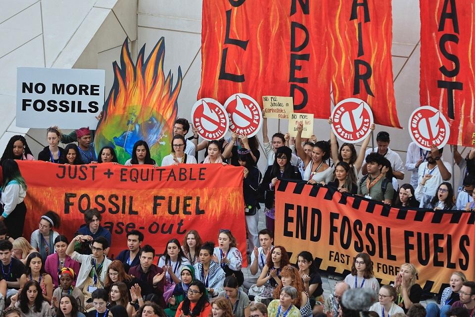 Climate activists protest against fossil fuels at COP28 in Dubai