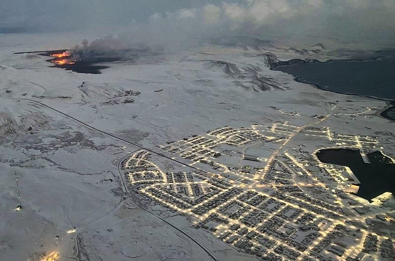 Lava flows from Iceland volcano slow as heavy snow sets in
