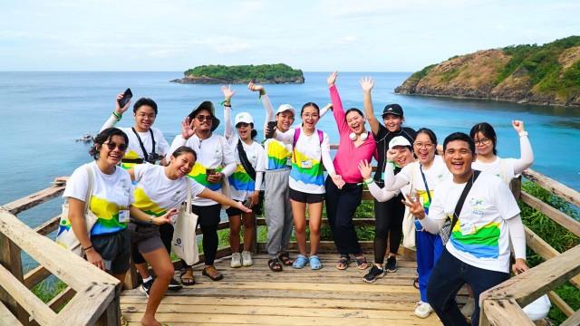 Student ambassadors pose for a photo at the view deck of Santelmo Cove in Hamilo Coast