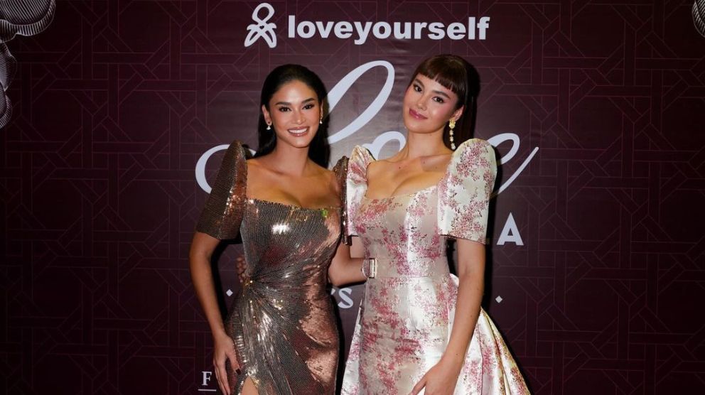 Pia Wurtzbach and Catriona Gray strike a pose at Love Gala 2023 red carpet