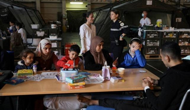 Palestinians are seen in the hospital onboard the Dixmude January 21, 2024. REUTERS/ Mohamed Abd El Ghany 