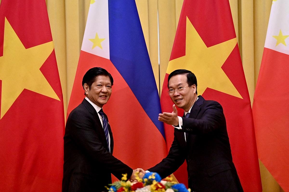 Philippines, Vietnam seal deals on South China Sea security, rice