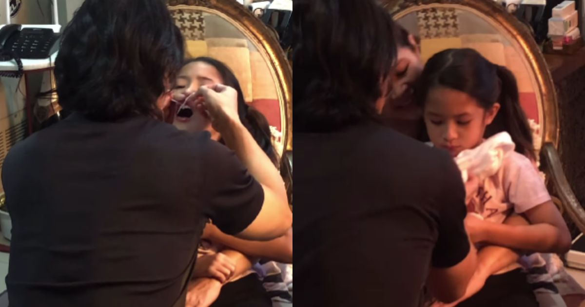 Ryan Agoncillo removes daughter Luna's baby tooth at home using a thread