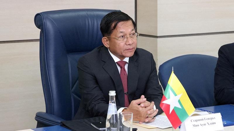 Myanmar junta chief calls for unity, says military holding power ‘temporarily”
