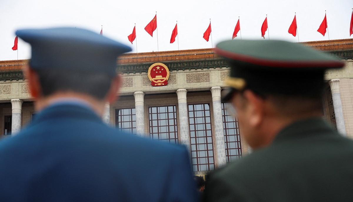 China drops ‘peaceful reunification’ reference to Taiwan, raises defense spending