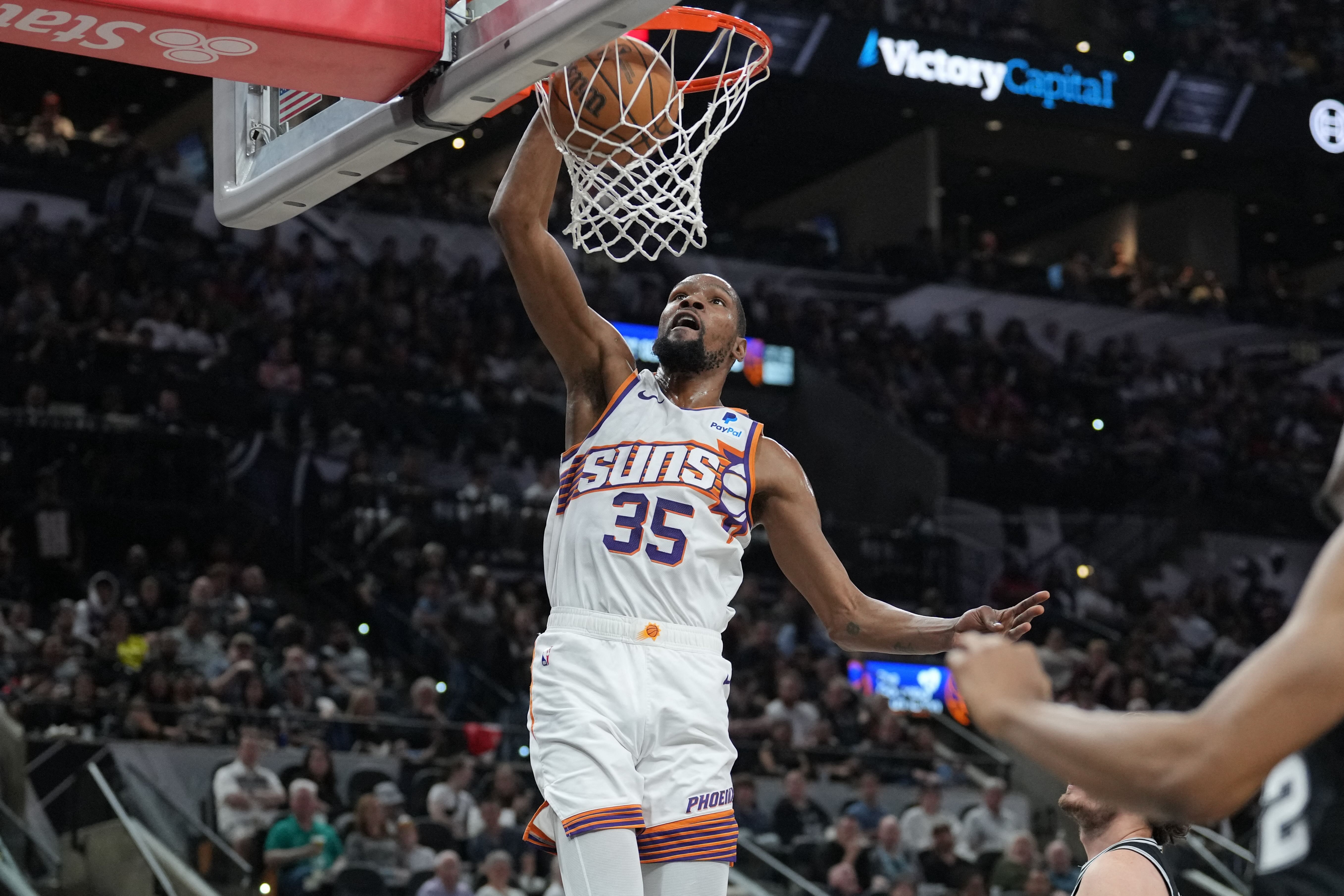 NBA: Booker, Durant combine for 57 points as Suns crush Spurs